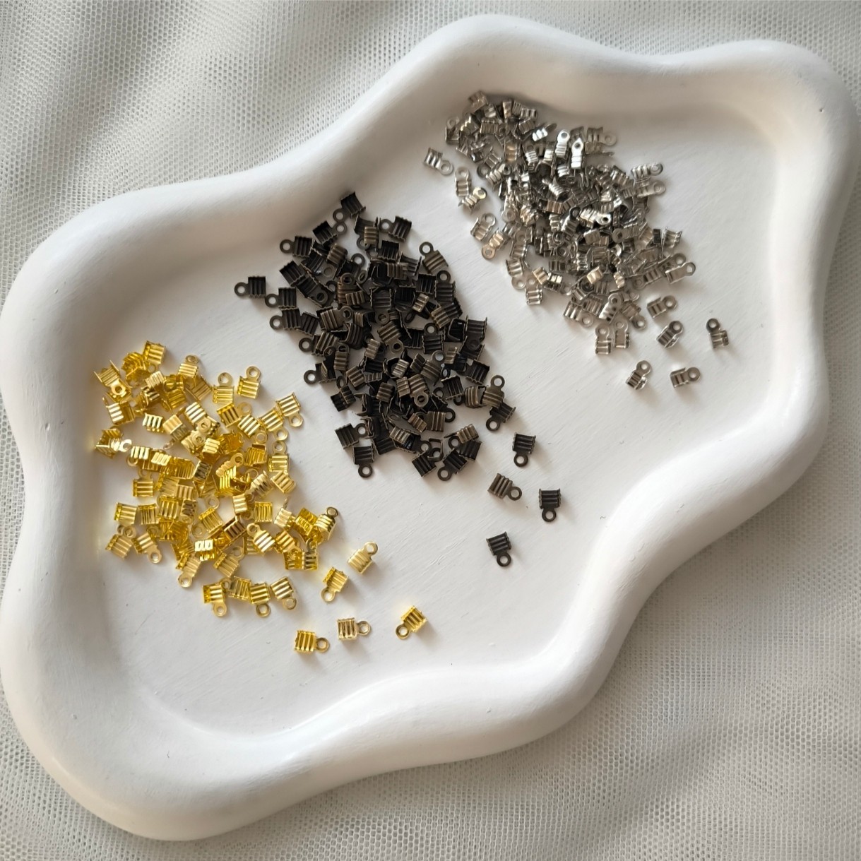 بست کتابی جنس آهنی (فروش بصورت بسته 5 گرمی)